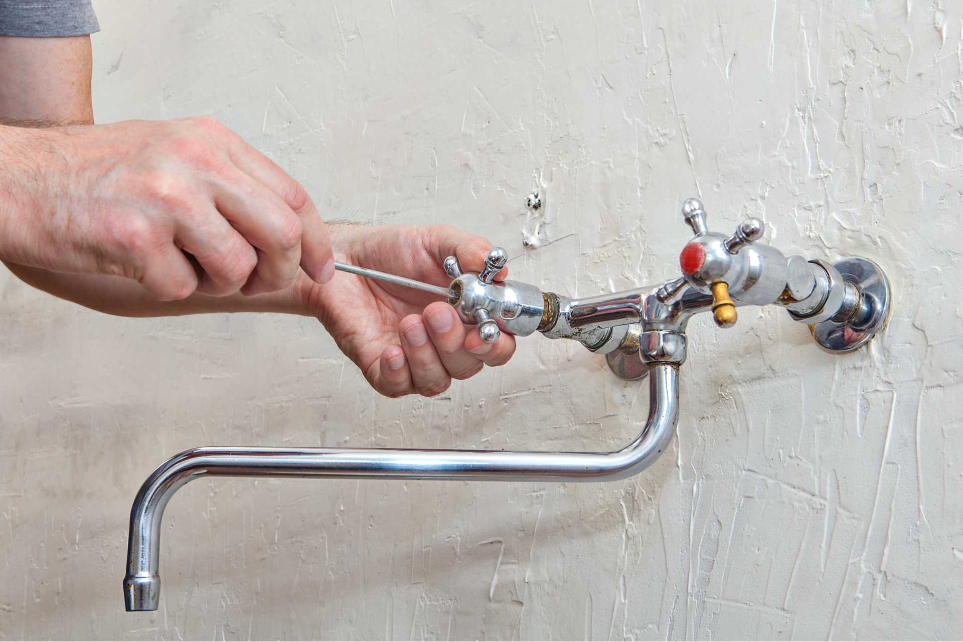 technician replacing tap valve